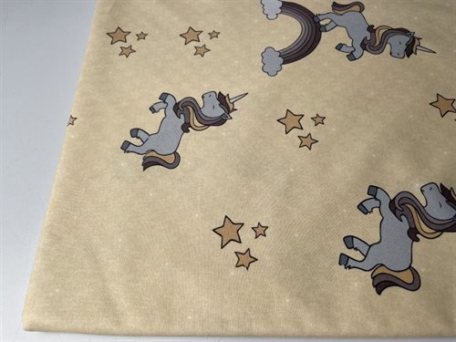 Patchwork stof (prøvetryk) - store søde enhjørninger på gullig nude bund, 275 cm